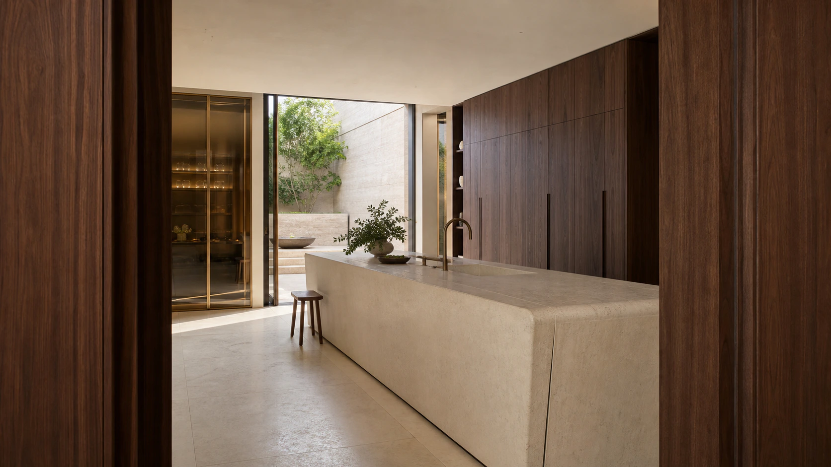 Bespoke limestone and walnut kitchen atelier by BORVEA
